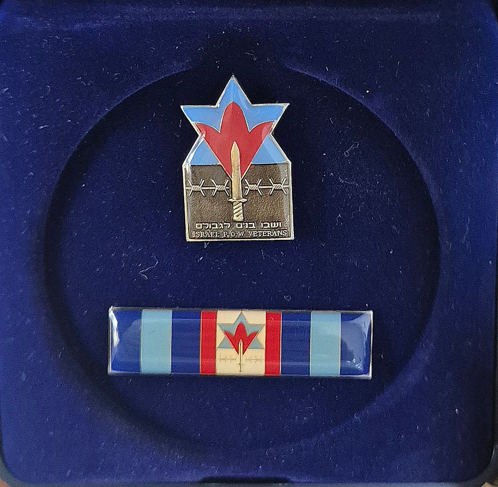 Hostage/prisoner pins given to Jonathan Etkes after his ordeal against the enemy in battle and 