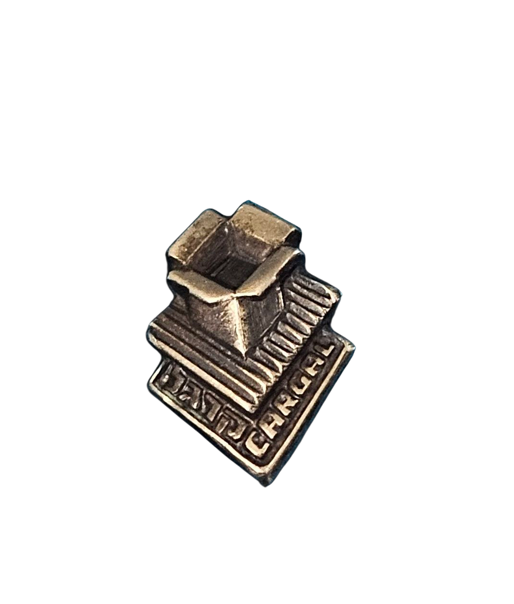 סיכת חברת קרגל. 
מידות 1.5X1 ס"מ. 
קרגל היא חברה ישראלית שהחלה את דרכה בייצור קרטון גלי 