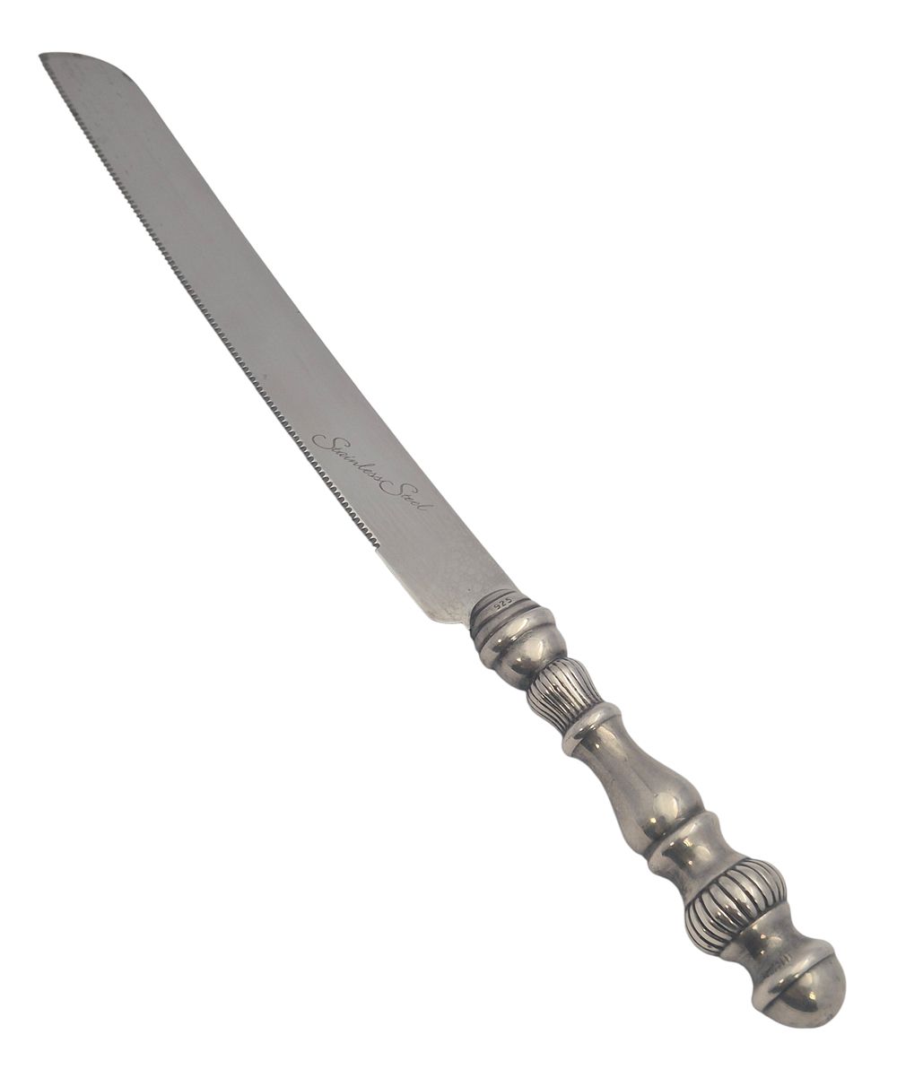 Silver plated stainless steel challah knife with detailwork on handle. 
Marked. 
Weight: 