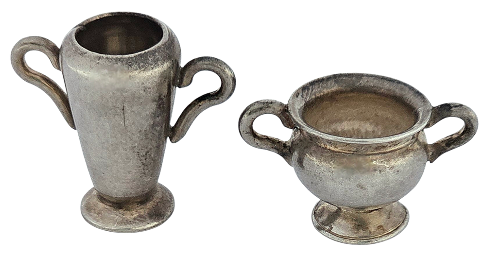 Two miniature vessels, one in the design of a vase and the other, a sugar bowl. Both with 