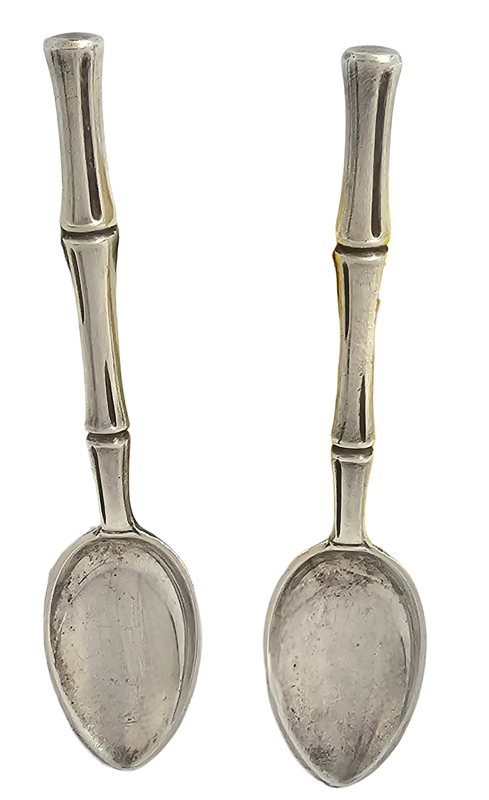 A pair of sterling silver Tiffiany &amp; Co. spoons with bamboo style handle. 
Marked. 