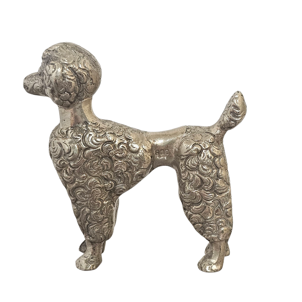 Silver miniature poodle dog. Made in Italy. 
Silver 800. 
Weight: 42.4g. 
4.5cm length x 