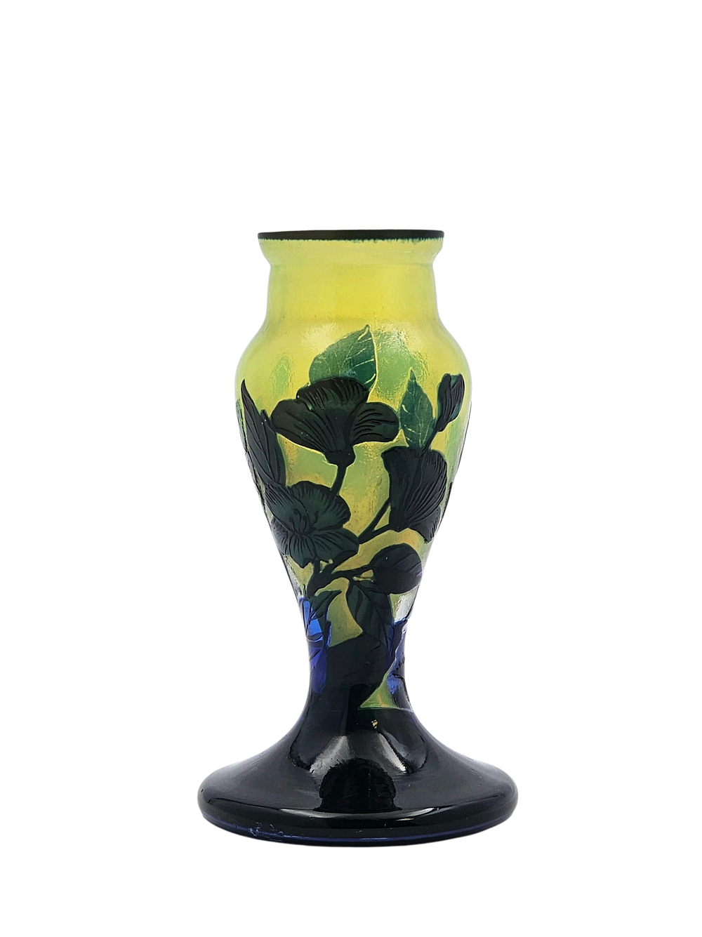 Carved glass vase with floral motif. 
17 cm height x 9cm diameter. 
No visible signature. 