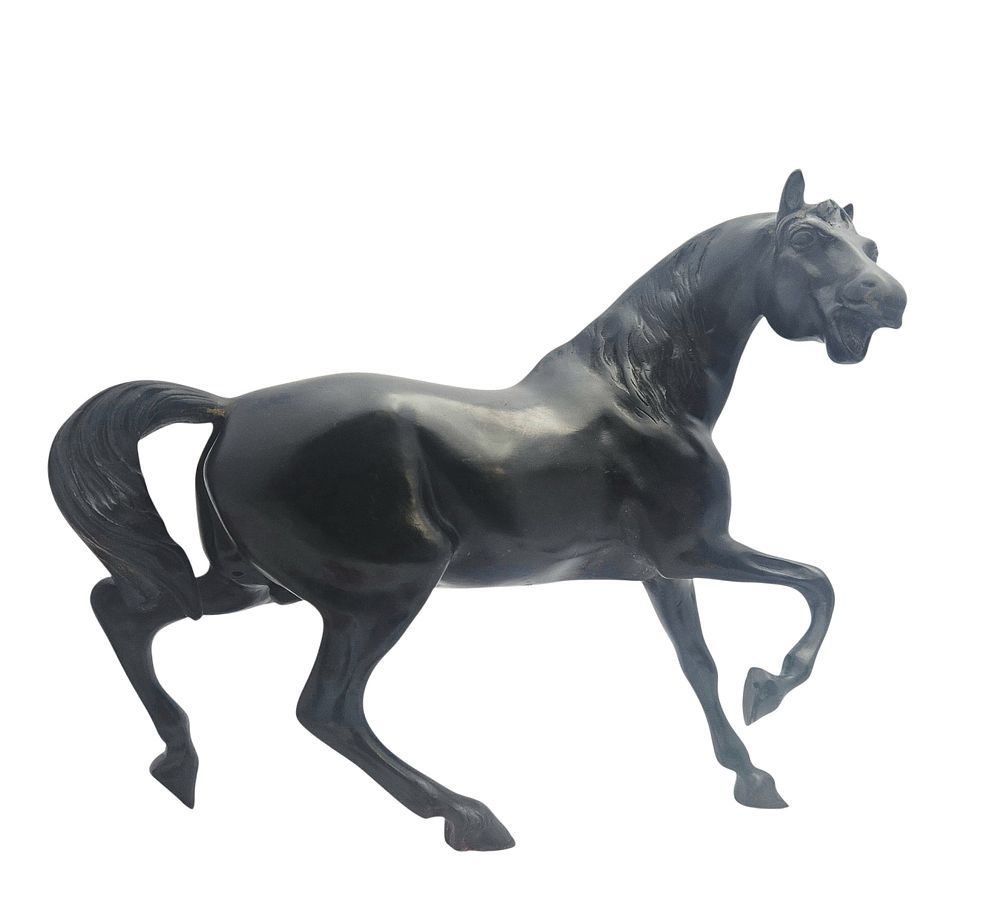 Bronze horse sculpture. 
26.5cm height x 30cm width x 5.5cm depth.