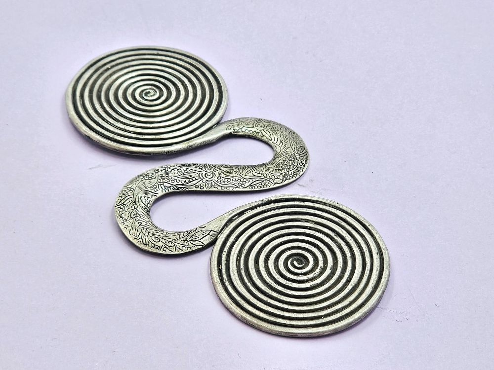 Tribal Tibetan Chinese pendant with engraved and embossed details. 
17.5cm x 9cm. 
From a 