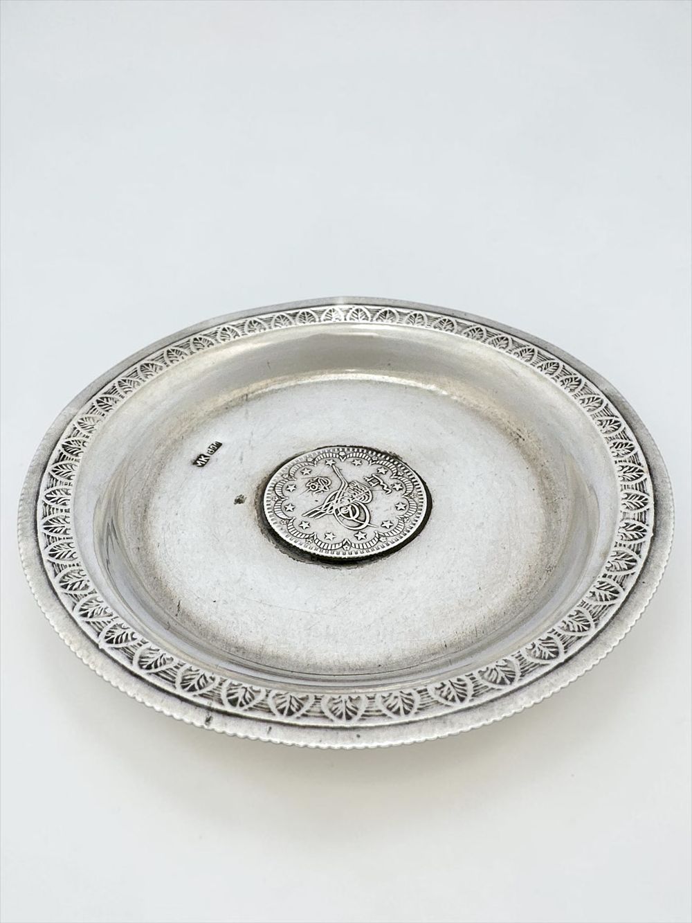 Ottoman dish made of silver 800 with silver 830 coin set at center, 5 Kuruş, from ~1877. 