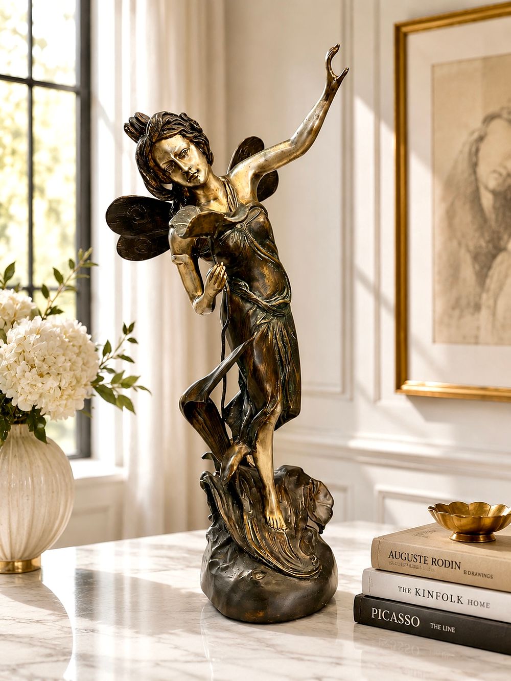 Art Nouveau bronze sculpture of a fairy-like figure with lily motif. 
55cm height x ~ 25cm x 