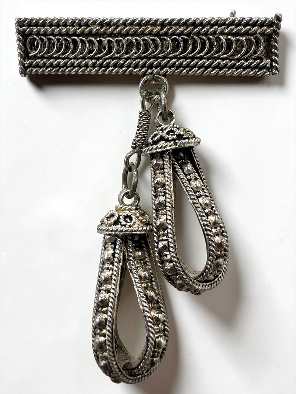 Rare silver filigree brooch with hanging ornamentation, by Bezalel Silver 925. Marked. In good 