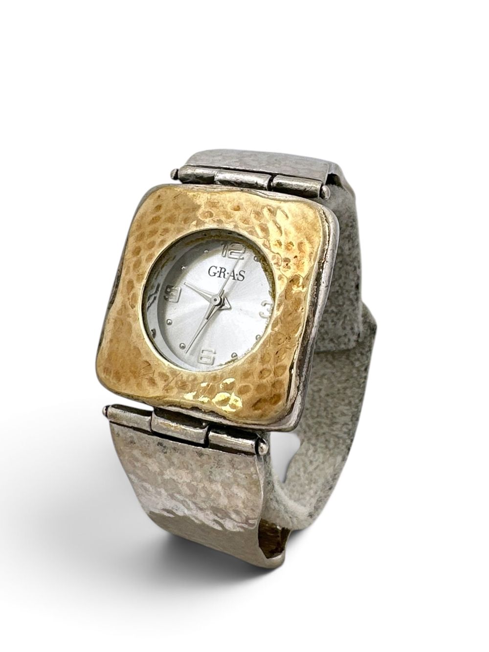 Watch crafted from 925 sterling silver with a thin gold overlay. By G.R.A.S. In working 