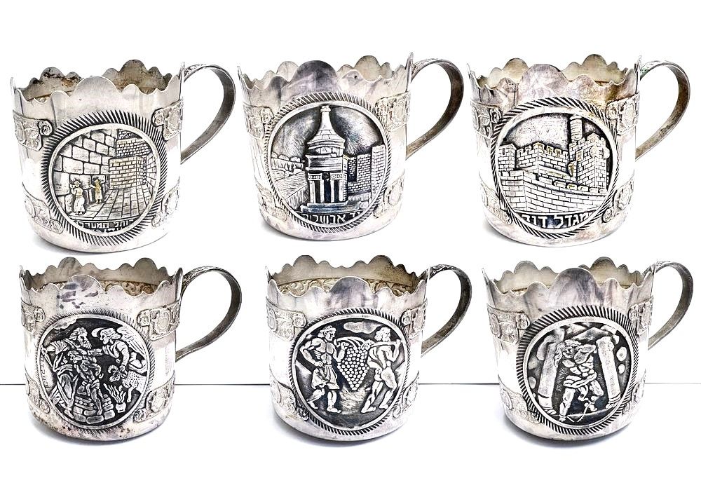 A set of six silver-plated cup holders featuring relief depictions of Absalom's Tomb, Rachel's 