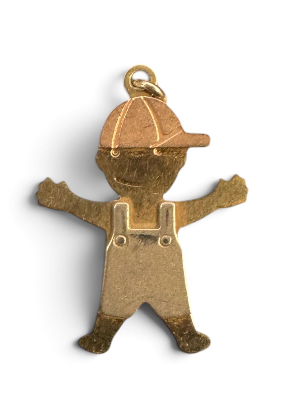 Charming 14k gold pendant in the shape of a young boy. 
Hallmarked. 
Dimensions: 1.7 x 2.2 cm. 