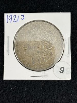 1921 S Morgan Silver Dollar Coin. KEY WORDS: INDIAN ARTIFACT ARTIFACTS ARROWHEAD ARROWHEADS 