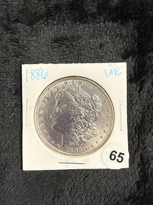 1886 UNC Morgan Silver Dollar Coin. KEY WORDS: INDIAN ARTIFACT ARTIFACTS ARROWHEAD ARROWHEADS 