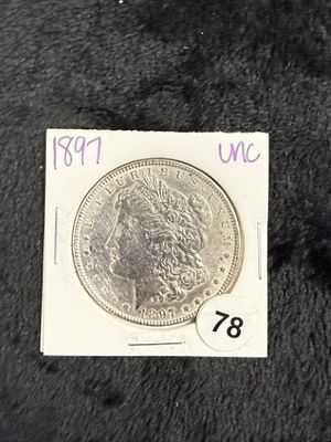 1897 UNC Morgan Silver Dollar Coin. KEY WORDS: INDIAN ARTIFACT ARTIFACTS ARROWHEAD ARROWHEADS 