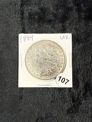 1884 UNC Morgan Silver Dollar Coin. KEY WORDS: INDIAN ARTIFACT ARTIFACTS ARROWHEAD ARROWHEADS 