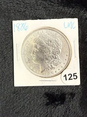 1886 UNC Morgan Silver Dollar Coin. KEY WORDS: INDIAN ARTIFACT ARTIFACTS ARROWHEAD ARROWHEADS 