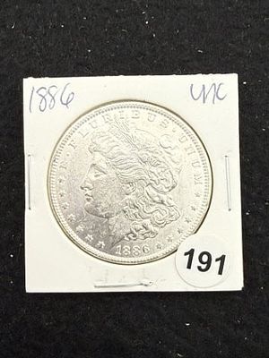 1886 UNC Morgan Silver Dollar Coin. KEY WORDS: INDIAN ARTIFACT ARTIFACTS ARROWHEAD ARROWHEADS 