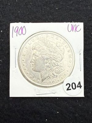 1900 UNC Morgan Silver Dollar Coin. KEY WORDS: INDIAN ARTIFACT ARTIFACTS ARROWHEAD ARROWHEADS 