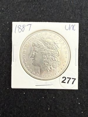 1887 UNC Morgan Silver Dollar Coin. KEY WORDS: INDIAN ARTIFACT ARTIFACTS ARROWHEAD ARROWHEADS 