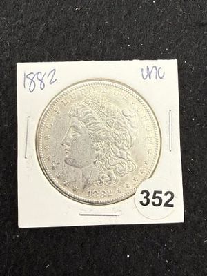 1882 UNC Morgan Silver Dollar Coin. KEY WORDS: INDIAN ARTIFACT ARTIFACTS ARROWHEAD ARROWHEADS 