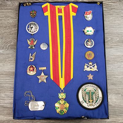 WWI, WWII, FRENCH, SOVIET & FINNISH ARTIFACTS IN VINTAGE LEATHER-LINED CASE. This lot includes 