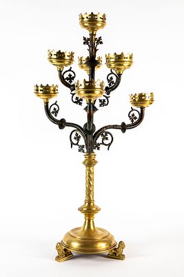 An antique late 19th or early 20th-century candlestick, in the Neo-Gothic style, apparently 