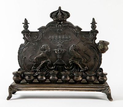 An antique German Hanukkah lamp, made by W.M.F., made of metal, silver plating residue 