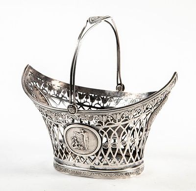 Antique silverware, hand-sawn work, decorated with the figure of Venus, an angel, and a dolphin 