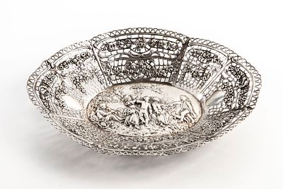 An antique German silver bowl, made of 800 silver, hallmarked, with relief decorations 