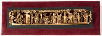 UNKNOWN ARTIST. Asian temple scene 
Gilded wood relief on a wooden panel covered with red velvet 