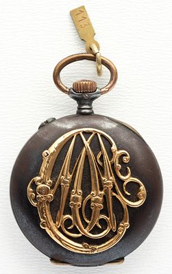 (113) SMALL LONGINES NECKLACE WATCH (SAUTOIR) WITH GOLD MONOGRAM M.C., CIRCA 1890/1900. Blackened 