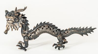 DRAGON. China, probably silver-plated, 1st half 20th century. 
L: 13 cm