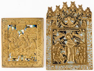 2 RUSSIAN ENAMELLED METAL ICONS SHOWING THE MOTHER OF GOD 'JOY OF ALL WHO SORROW' AND THE HOLY 