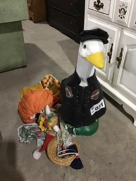 Lot 31: DRESS A DUCK CONCRETE STATUE W ACCESSORIES