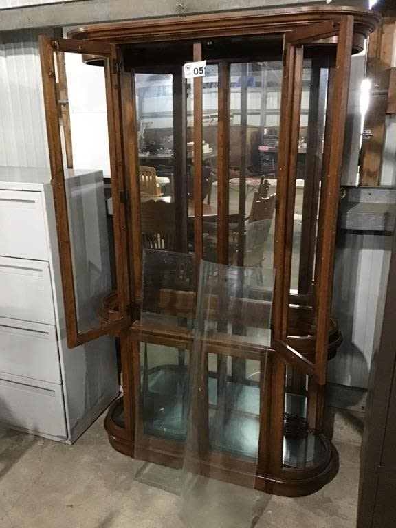 Lot 51: LIGHTED CURVED GLASS CURIO CABINET 76 x 45