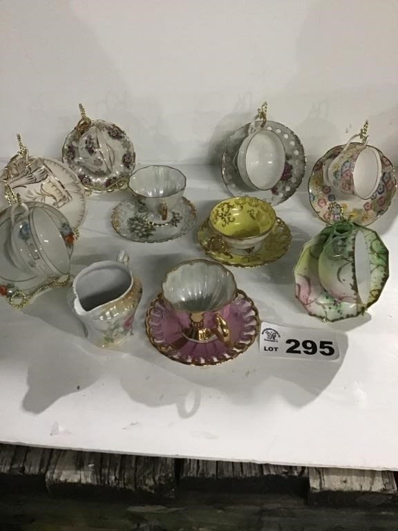 Lot 295: CUPS AND SAUCERS