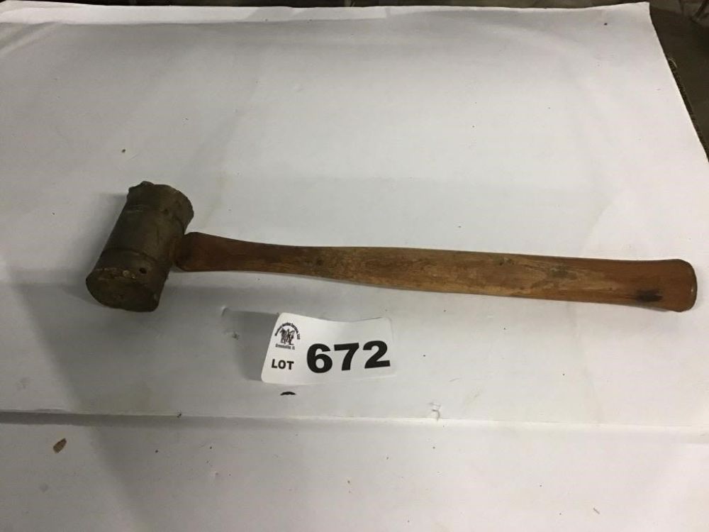 Lot 672: BRASS HAMMER