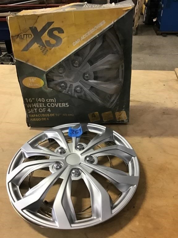 Lot 359: SET OF 4, 16 IN WHEEL COVERS, NIB