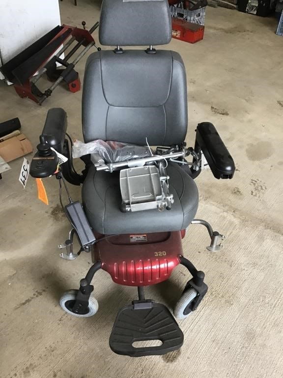 Lot 539: ELECTRIC WHEEL CHAIR.  NEEDS BATTERIES