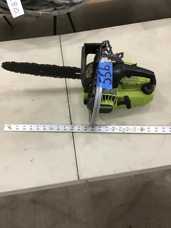 Lot 556: POULAN CHAIN SAW.