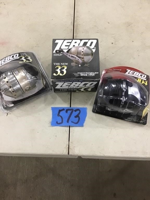Lot 573: 3. ZEBCO FISHING REELS.   NIB