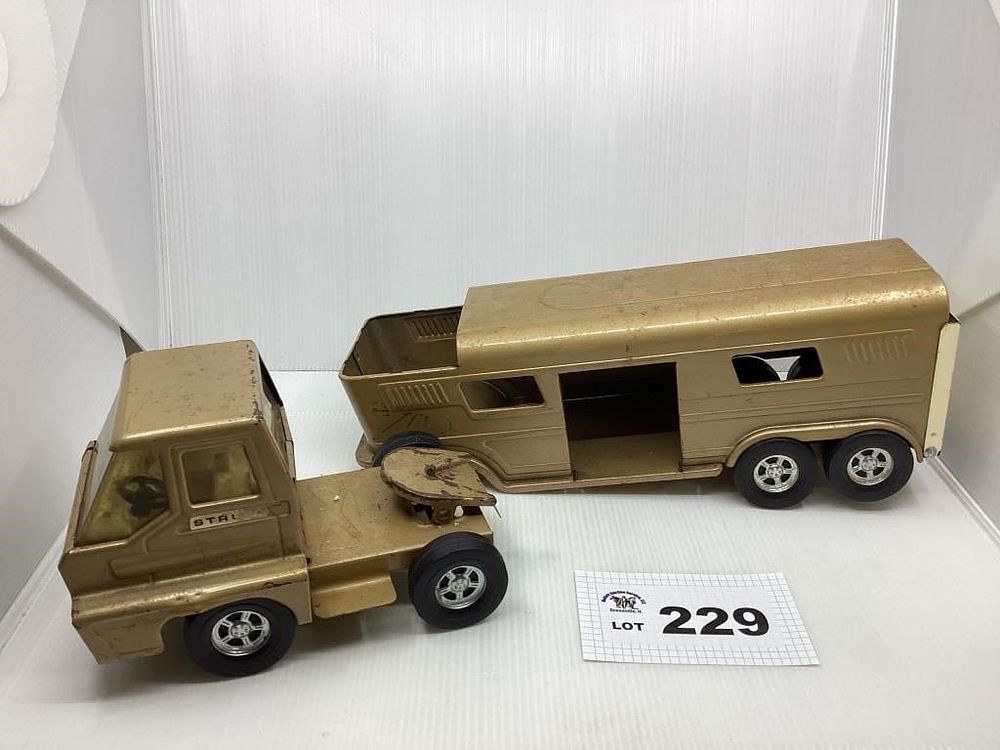 Lot 229: SEMI AND CATTLE TRAILER