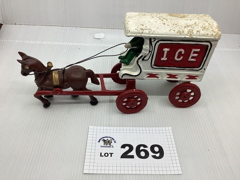 Lot 269: CAST IRON ICE HORSE AND TRAILER