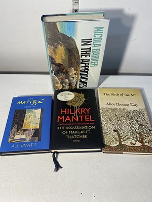 A selection of hardback books all signed by the various authors