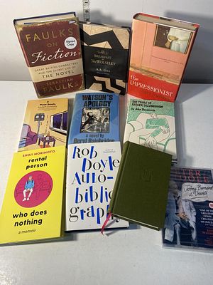 A selection of assorted hardback books including first editions