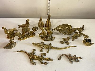 A job lot of assorted brass animal ornaments, shipping unavailable