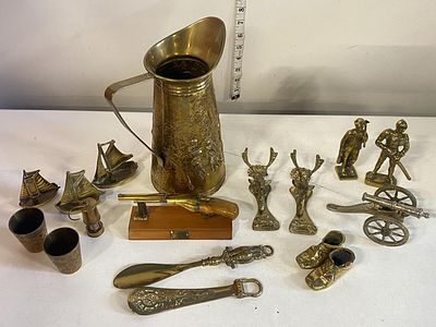 A job lot of assorted brass ornaments including door knockers, shipping unavailable