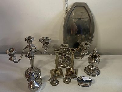 A job lot of assorted silver plated ware including candlesticks, shipping unavailable