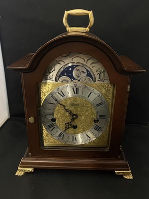 A Hermle bracket clock with moon phase dial, shipping unavailable