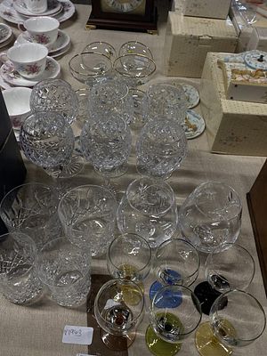 A selection of assorted glassware to include Babycham, Waterford etc, shipping unavailable